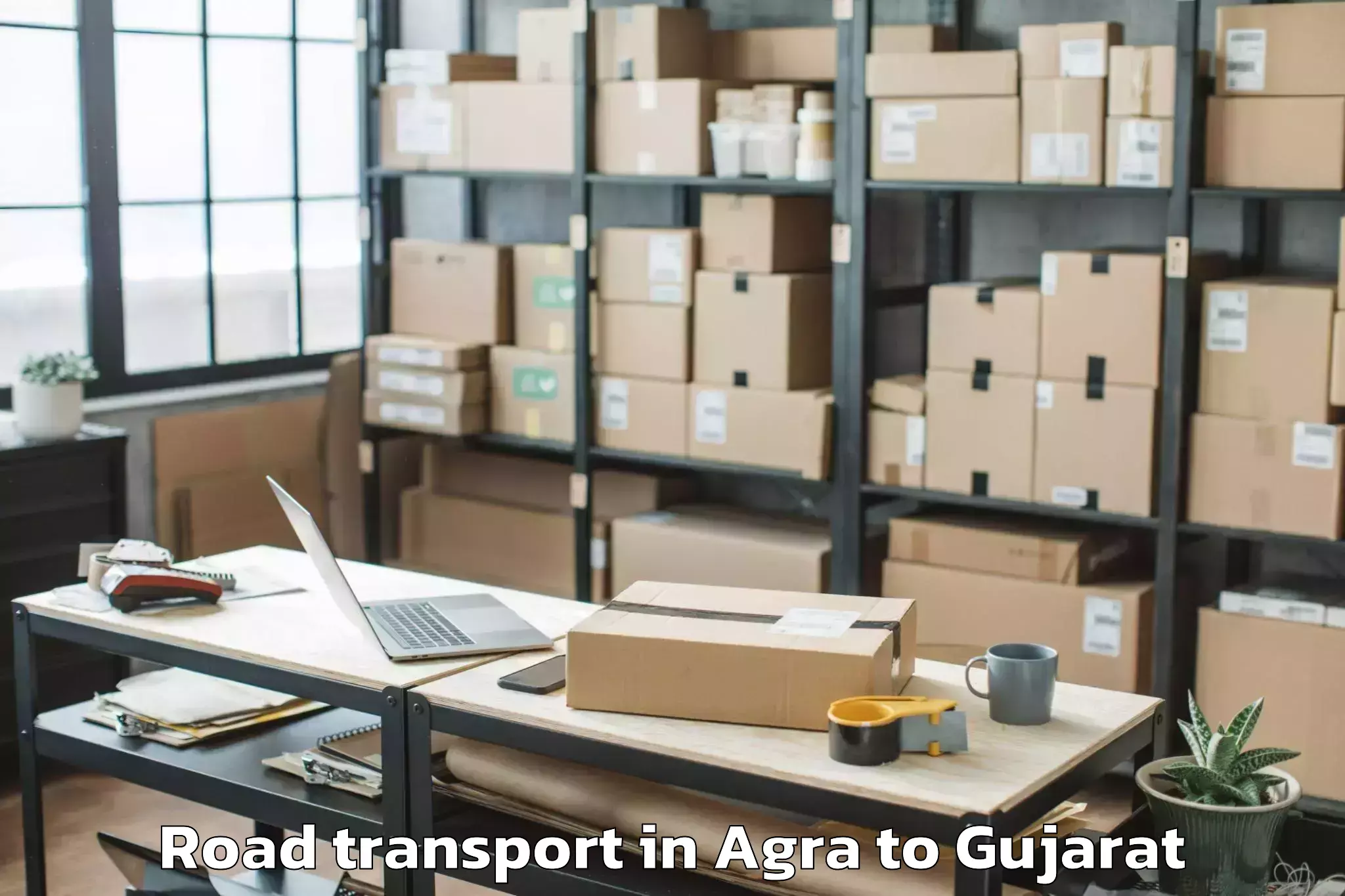 Book Your Agra to Sarkhej Road Transport Today